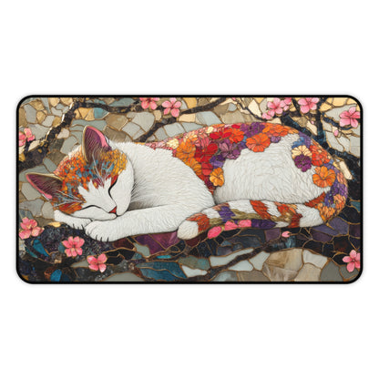 A White Calico Cat  Sleeping On Cherry Blossom Tree Desk Mat